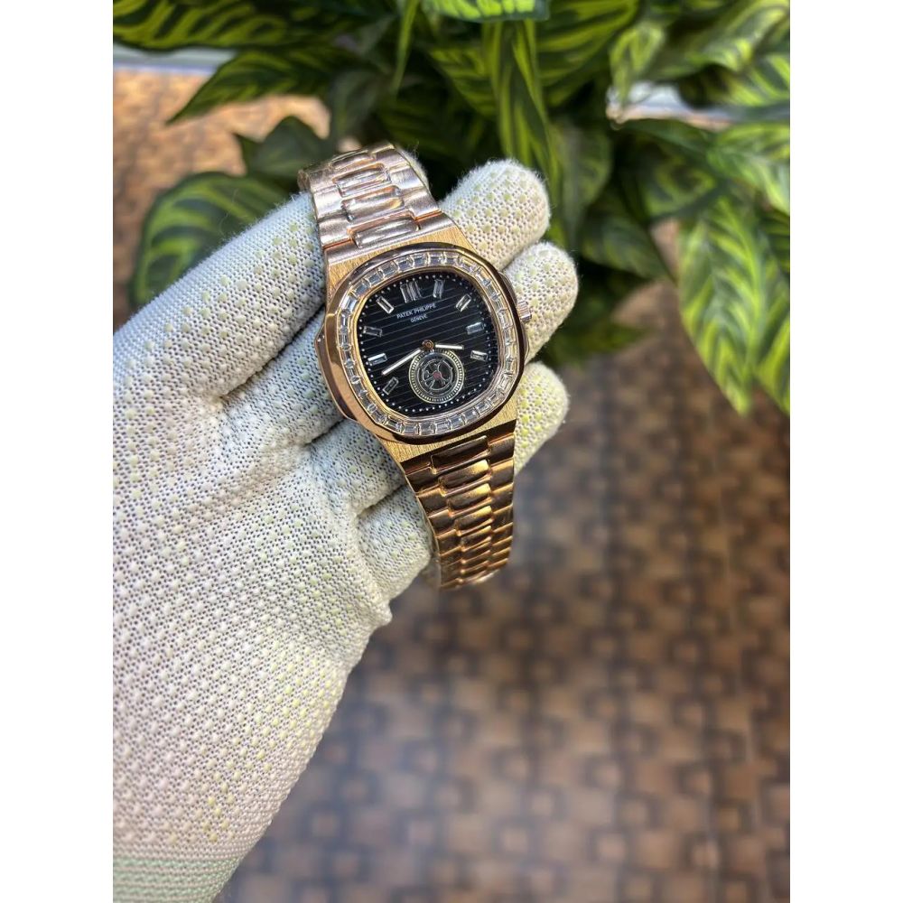 Patek Philippe Nautilus baguette diamond-set bezel.
