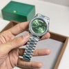 Rollex Day Date Diamond Bezel Green Dial