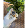 Patek Philippe Nautilus baguette diamond-set bezel.