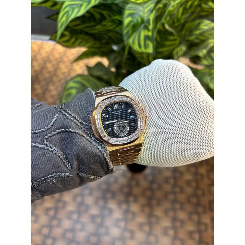 Patek Philippe Nautilus baguette diamond-set bezel.