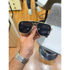gucci 1295 gold black