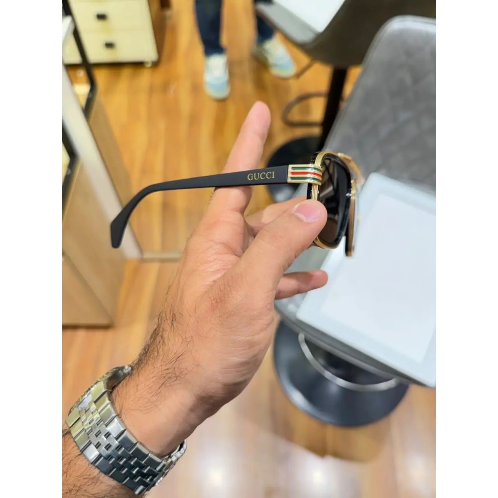 gucci 1295 gold black