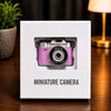 MINATURE CAMERA PURPLE NO RETURN