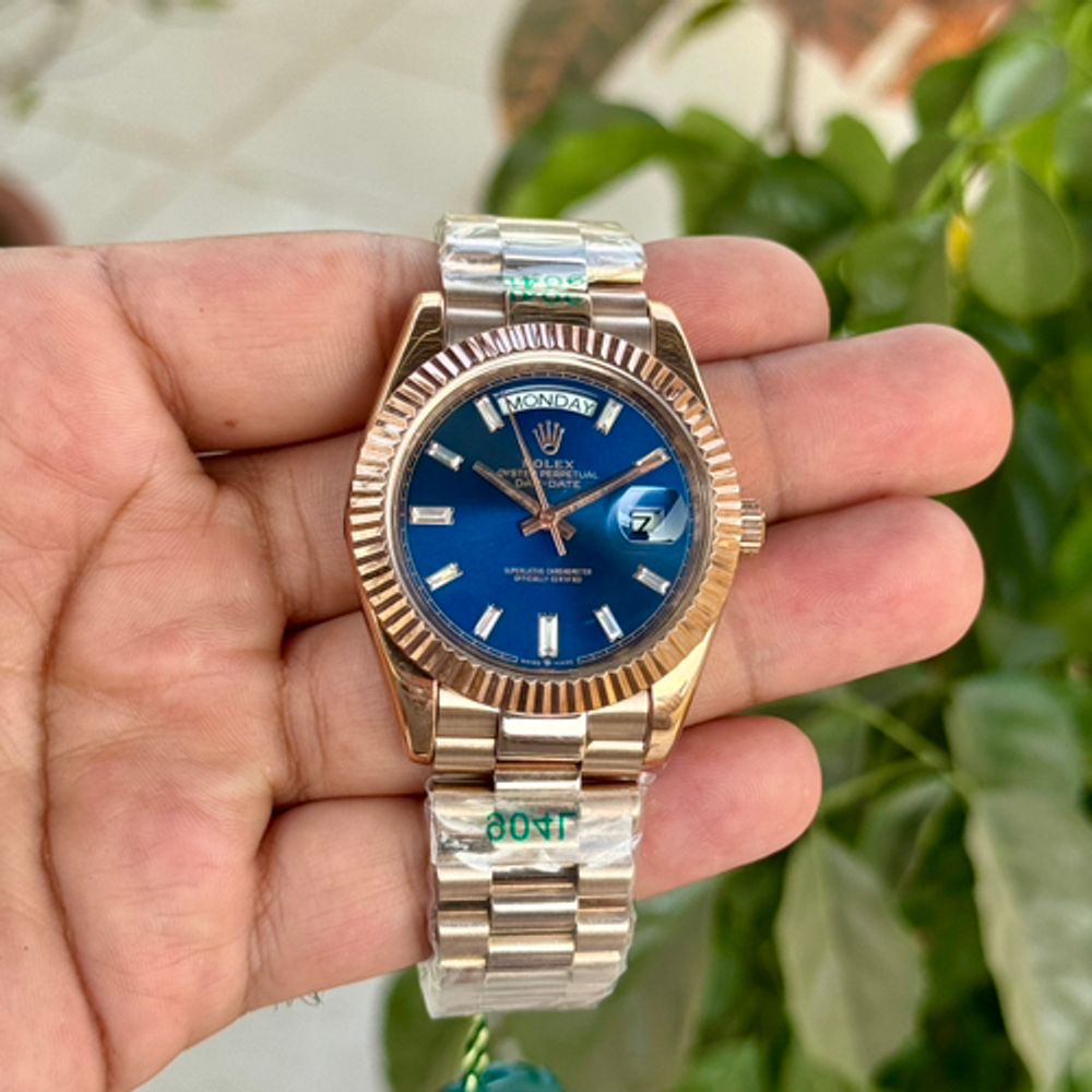 Rollexx day date Rose Gold Blue Baguette