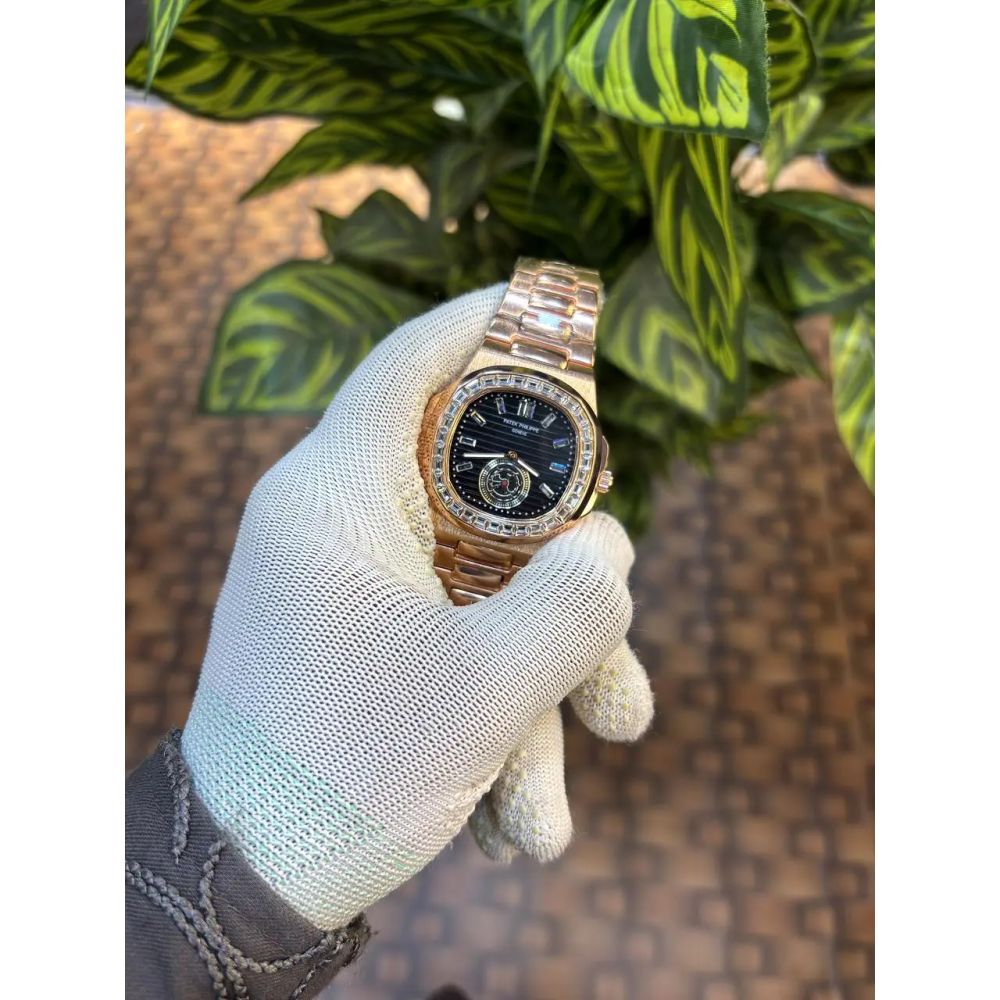 Patek Philippe Nautilus baguette diamond-set bezel.
