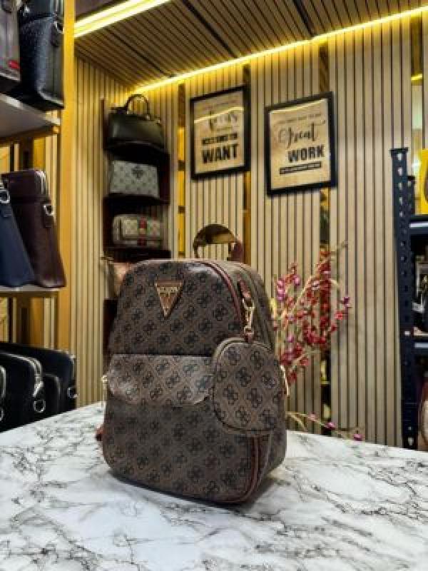 GUESS WOMENS BRAND LOGO BAGPACK WITH DUST BAG AND POUCH (DARK BROWN)