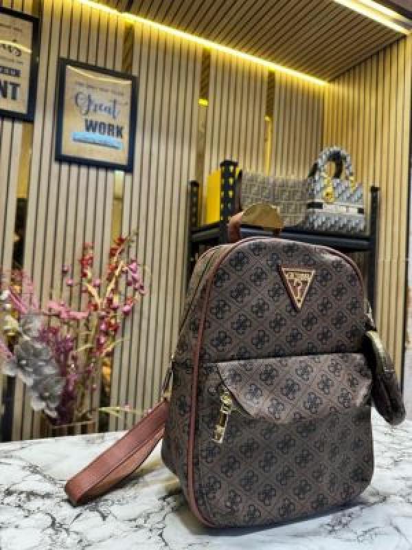 GUESS WOMENS BRAND LOGO BAGPACK WITH DUST BAG AND POUCH (DARK BROWN)