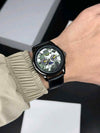 ARMA_EXCHANGE GOLD WITH SUN MOON DIAL AX1738 ALL BLACK
