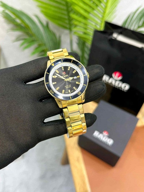 RADO_ CAPTAIN COOK GOLD BLACK
