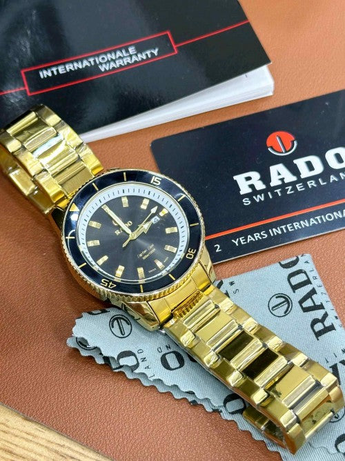 RADO_ CAPTAIN COOK GOLD BLACK