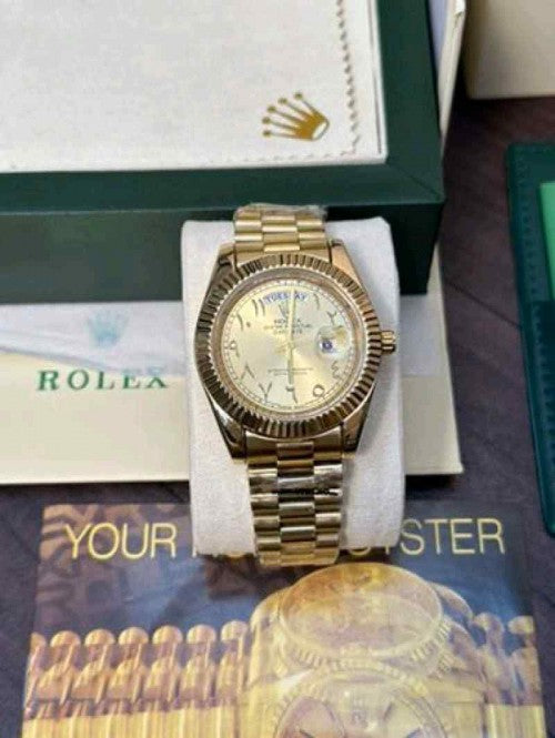 rolex_ day date  quartz  gold Arabic dial 30F10