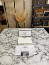 COAC_H EMBOSSED ZIP WALLET WITH GOLD HARDWARE INCLUDES BOX AND DUST BAG (CD002-WHITE)