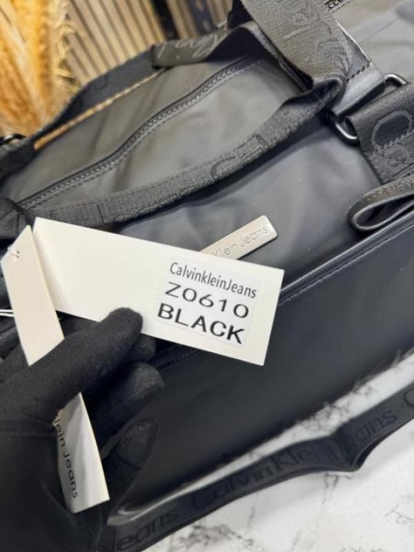 Calvin_Klein Black Travel Duffle Bag with Front Zip Pocket & Logo Detail (Z0610-Black)