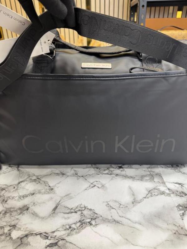 Calvin_Klein Black Travel Duffle Bag with Front Zip Pocket & Logo Detail (Z0610-Black)