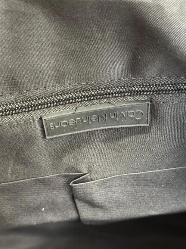 Calvin_Klein Black Travel Duffle Bag with Front Zip Pocket & Logo Detail (Z0610-Black)
