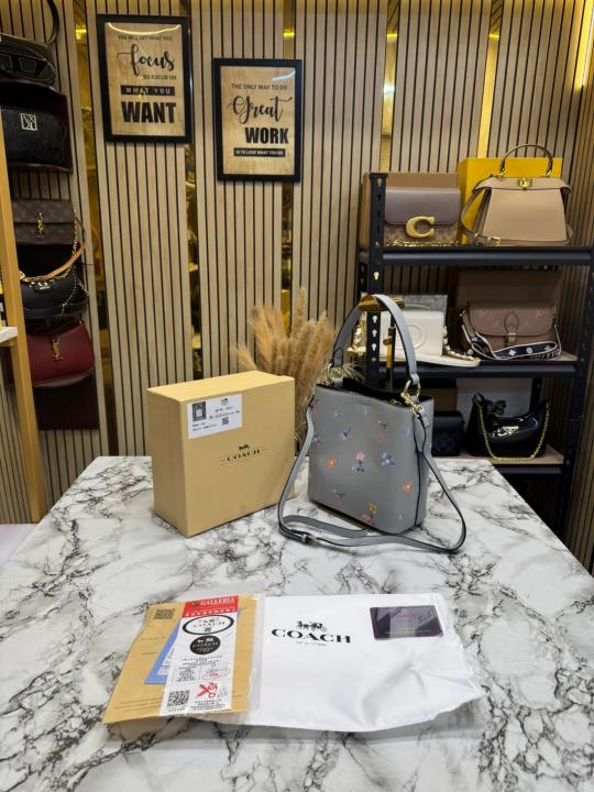 Coac_h Bucket Crossbody Bag With Signature Floral Print (Grey Flower)