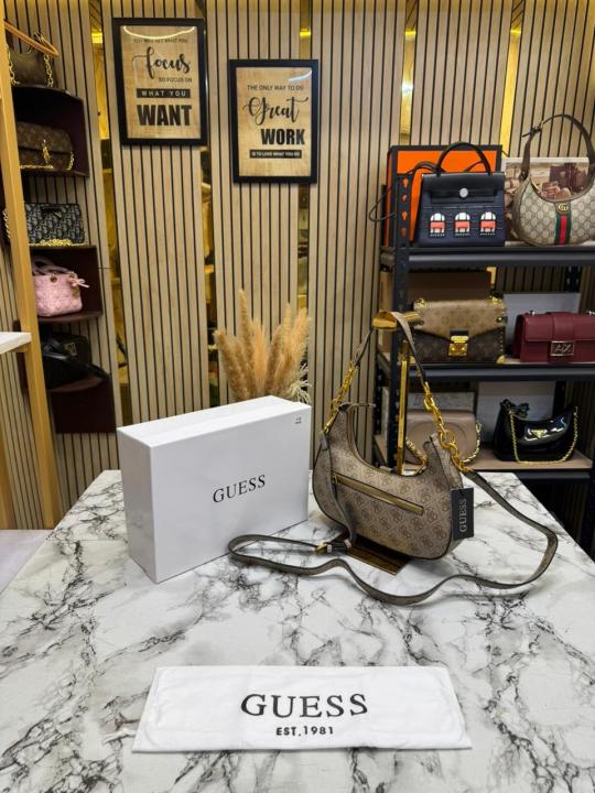 Guess Signature Crescent Hobo Shoulder Bag With Gold Chain (Stone Beige)
