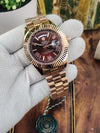 ROLLEX DAYDATE ROSEGOLD BROWN ROMAN DIAL AT299