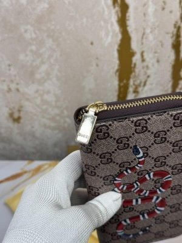 GUCC_I LONG ZIP AROUND WALLET WITH OG BOX AND DUST BAG (APRICOT SNAKE) 60017