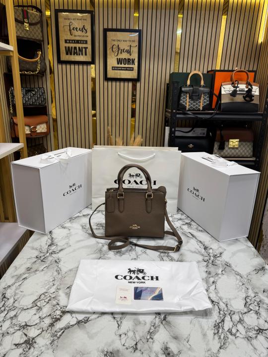 Coac_h Maggie Pebbled Leather Top Handle Crossbody Bag With Magnetic Box Including Carry Bag (Khaki) (C7)