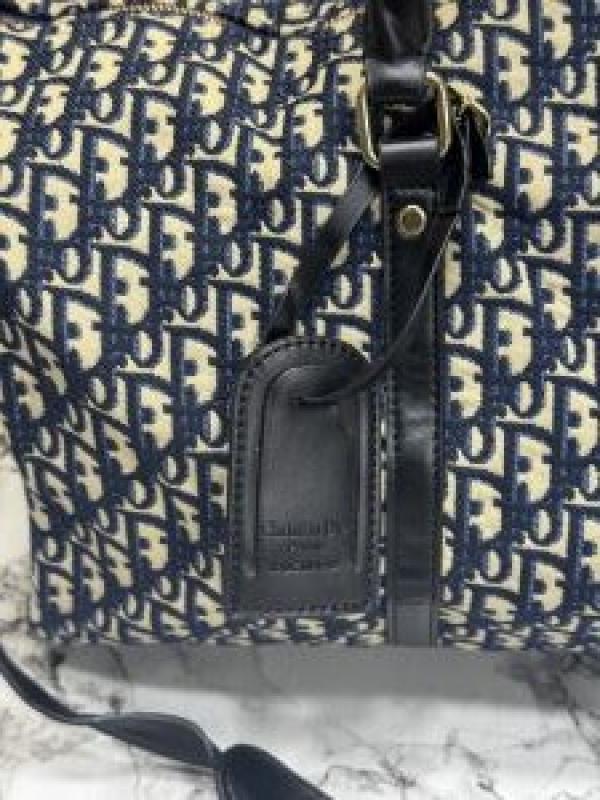 CHRISTIAN DIO_R DUFFLE PREMIUM QUALITY WITH DUST BAG SLING AND TAG (BLUE) (V20)