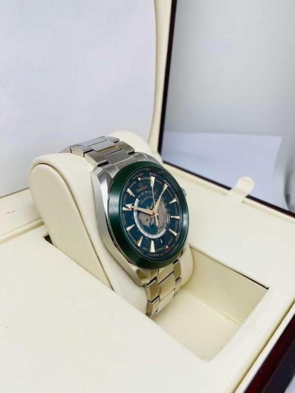 Omegg_a Seamaster Aqua Terra World Time with a green dial