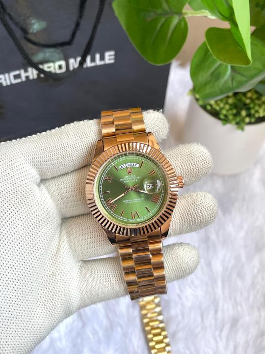 ROLEEX DAYDATE ROSEGOLD GREEN ROMAN DIAL AT299