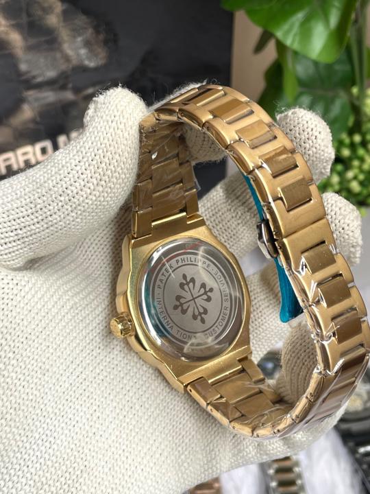 PATEK PHILIIPPE SUN GOLD BLACK DIAL AT456