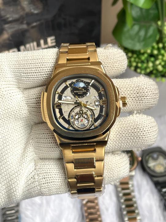 PATEK PHILIIPPE SUN GOLD BLACK DIAL AT456