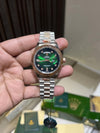 Roleex day date dual tone green dial