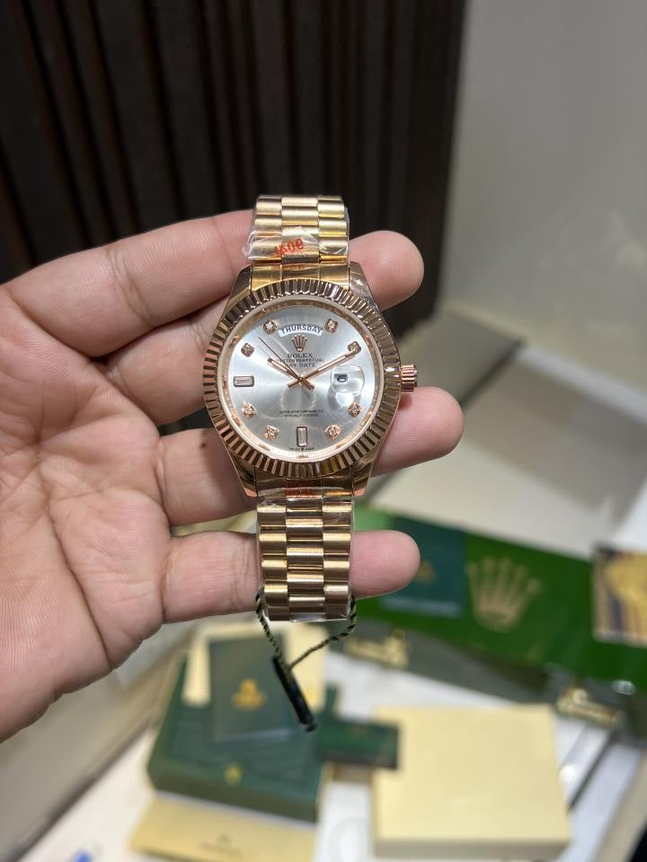 Roleex day date copper white dial
