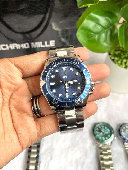 Seiko 5 Sports Day Date Open Back Silver Blue AT458