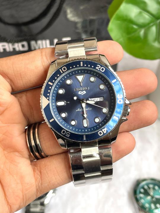 Seiko 5 Sports Day Date Open Back Silver Blue AT458