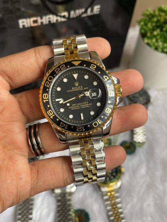 ROLEEX GMT MASTER 2 GOLD TWO TONE BLACK DIAL AT462