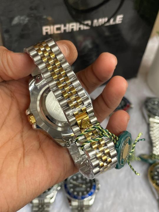 ROLEEX GMT MASTER 2 GOLD TWO TONE GREEN BLACK DIAL AT462