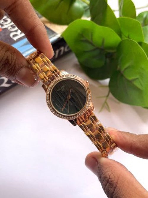 Tissot round green em5