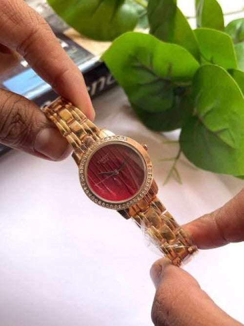 Tissot round red em5
