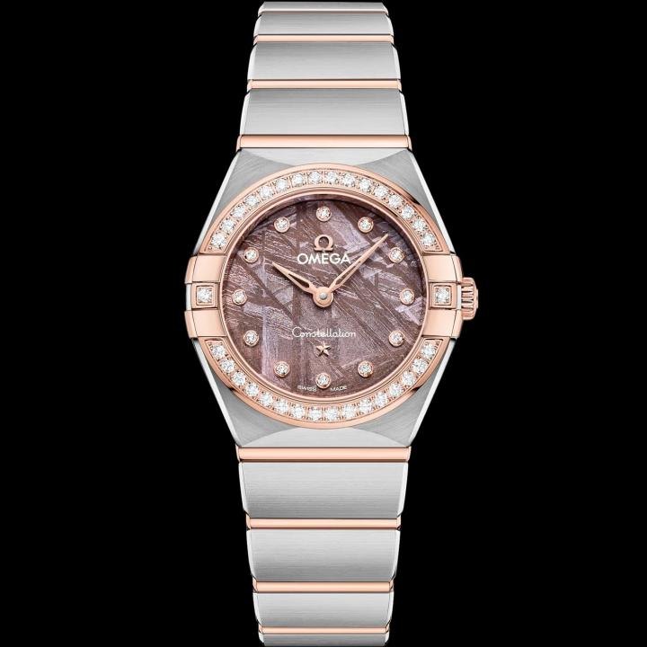 Omeg_ga Constellation Quartz luxury watch.