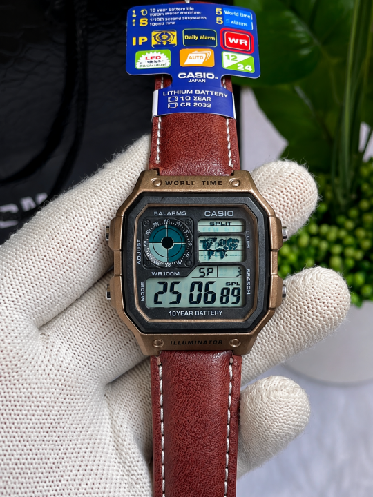 CASIO AE 1200 WORLD TIME ILLUMINATOR BROWN GOLD AT316