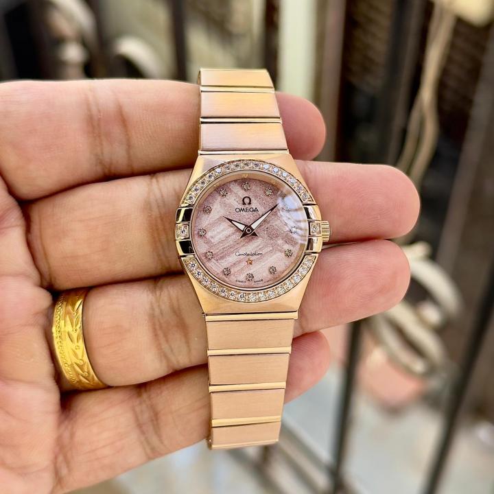 Omeg_ga Constellation Quartz luxury watch.