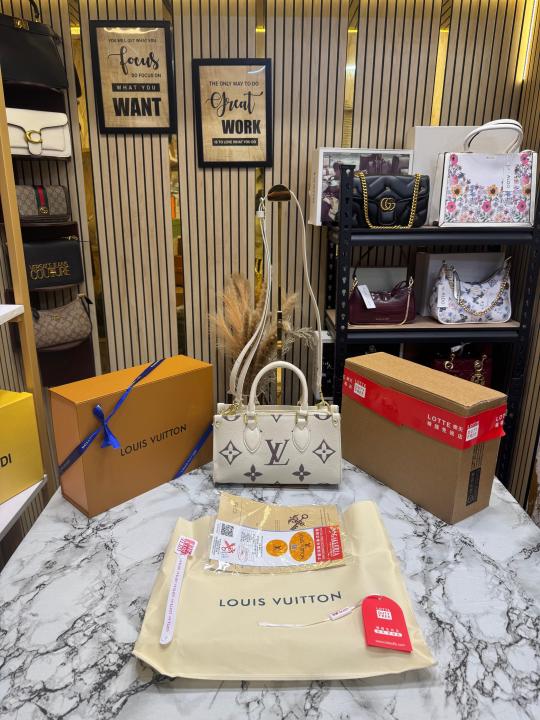 Loui Vuitton OnTheGo East West Bi-Color Monogram Handbag With Double Box Packaging (White)