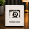 MINATURE CAMERA WHITE NO RETURN