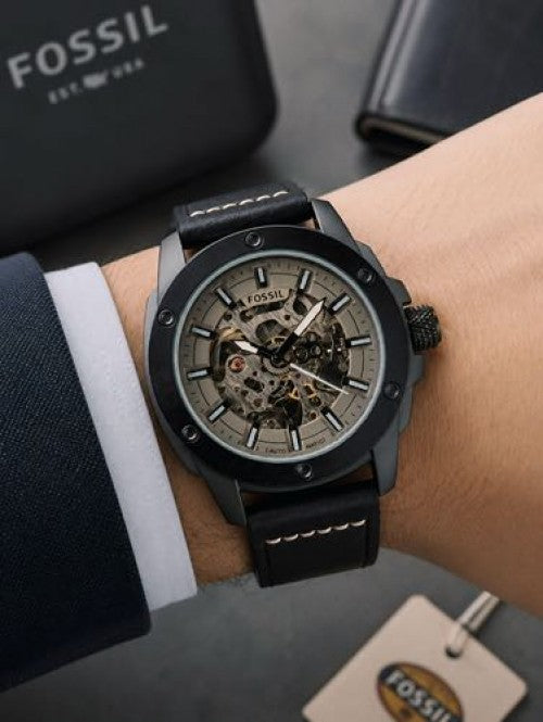 fossil auto em 52