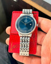 Omega em 55