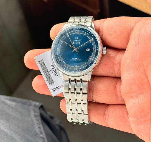 Omega em 55
