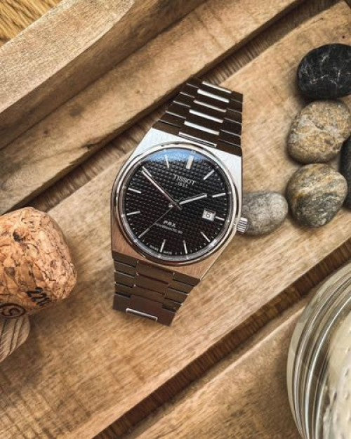 Tissot prx Auto em 61