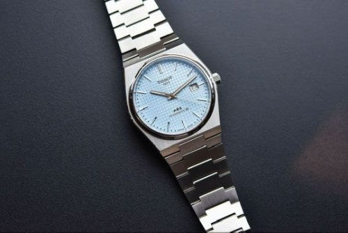 Tissot prx auto em 61