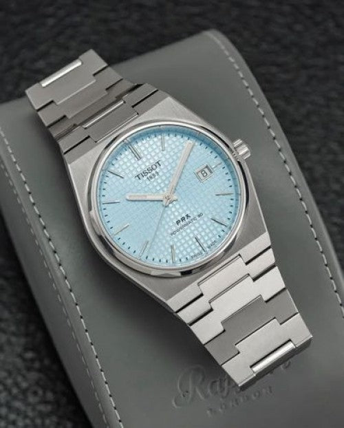 Tissot prx auto em 61