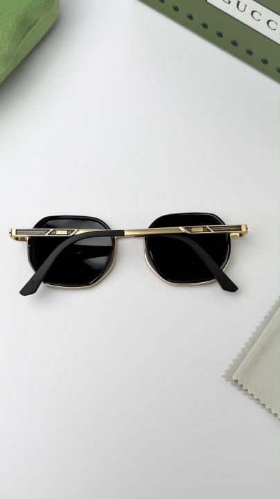 Guchi gold black 55923