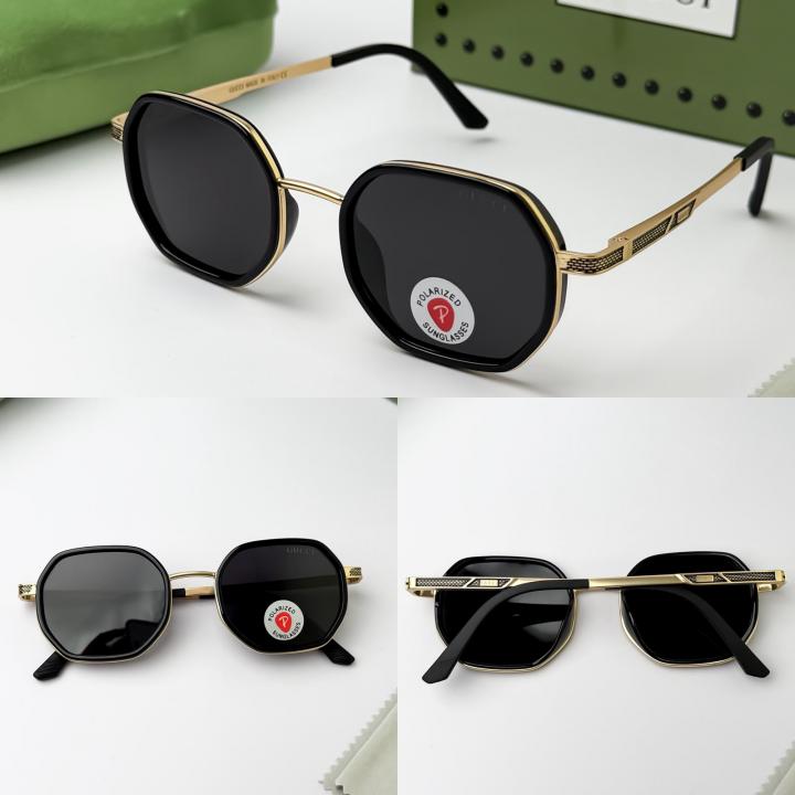 Guchi gold black 55923